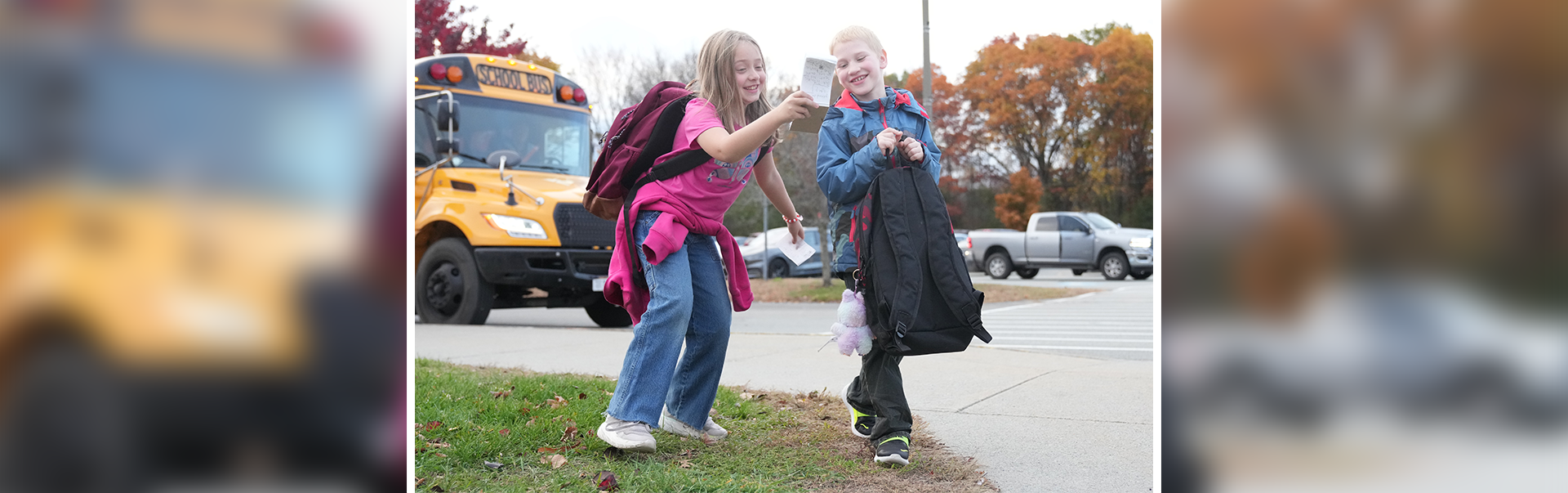 Image of two students sharing a moment.