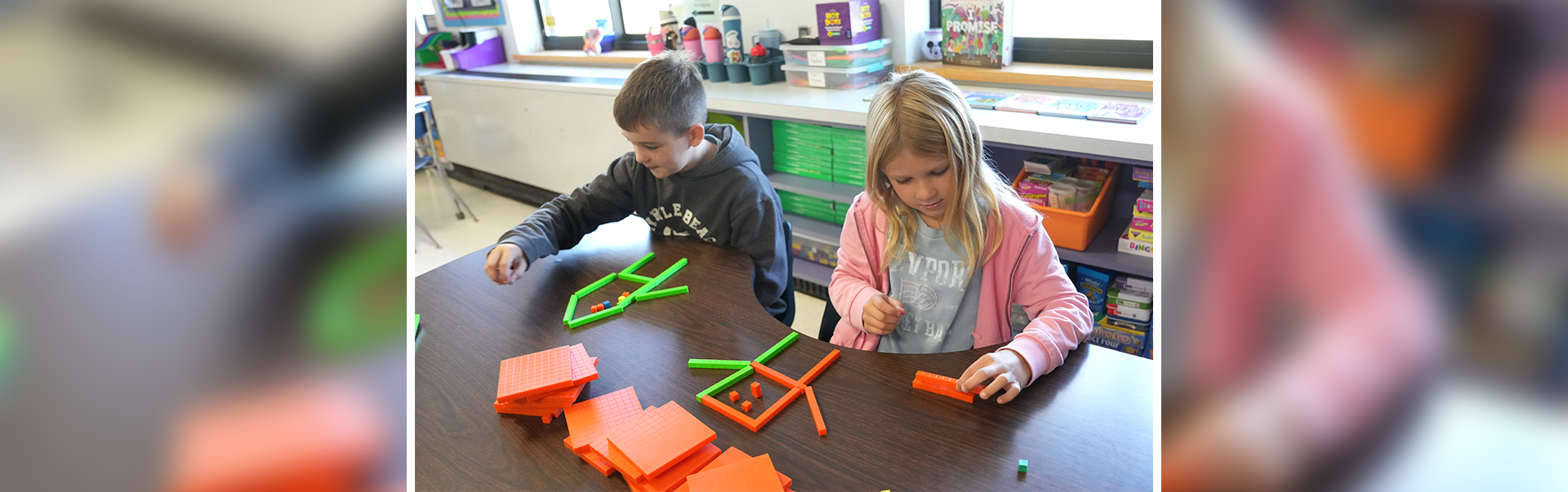 Image of two students enjoying their time in school.